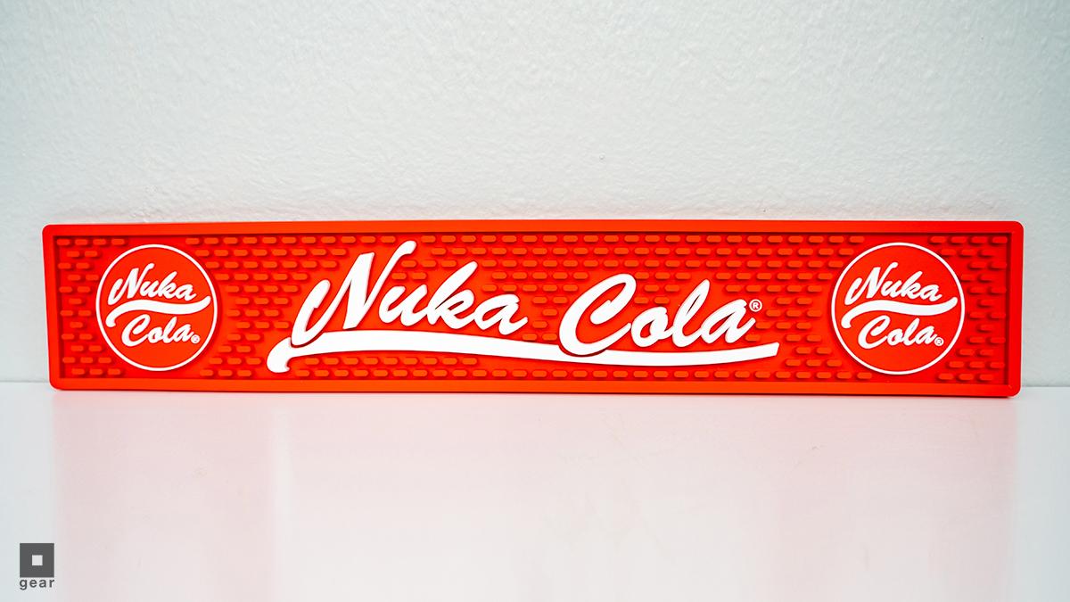 Nuclear fallout may be beyond your control, but a Nuka-Cola spill out is an  entirely avoidable tragedy! Get your glasses firmly in place with the @Fallout  Nuka-Cola Bar Mat! https://t.co/hQ1UtHHpFg, image size:1200x675