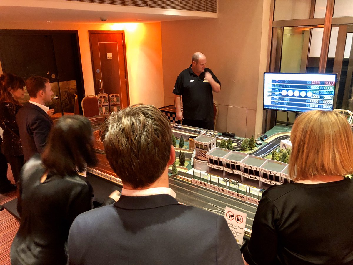 placetech's tweet photo. If you’re at Big Night Out, come and give the scalextric a shot. Fastest time gets a prix! 🍾 #PlaceTechPrize https://t.co/sjmzXAq18k