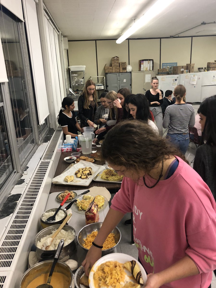 ISP_HPE's tweet photo. Dinner is served! Stroggonoff, Spanish omelettes, tomatoe rice, Nutella stars and of course, poutine! Chef’s hat off to all of our international students, Canadian Ambassador’s and a special thank you to Ms. Graszat for organizing such a special evening! https://t.co/EO9YztPxyP
