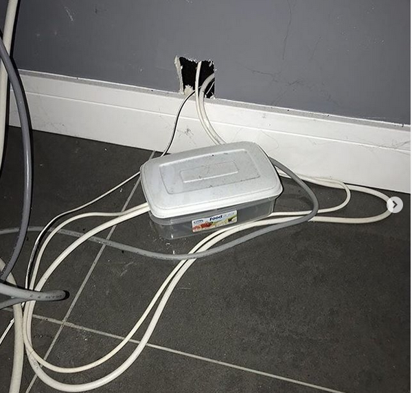 proelectrician's tweet image. This #caughtoncamera has been sent in by an anonymous source: “Check this out, found at a local sun bed salon behind every one of their 10 tanning booths.” 😱😱😱 #professionalectricianandinstaller #diyfails