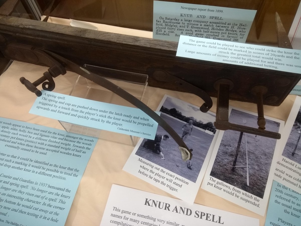 CMBClibraries's tweet photo. Sowerby Bridge Library. Here is a photo of Gary, our local history volunteer, setting up a display about the game of Knurr and spell. It will be on for 6 weeks. #cmbclibraries #localhistory https://t.co/2PtJ32Gikj