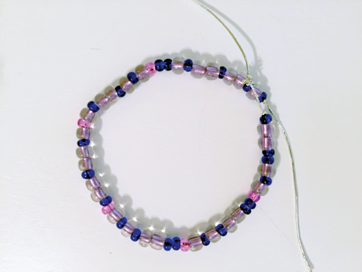 LearnWithNASA's tweet photo. What do you get when you cross computer coding with crafting? 
A binary bracelet! 

Find out how to make your own (with a secret message) at https://t.co/LwXeEnHO69. https://t.co/2bVW2oOpr8