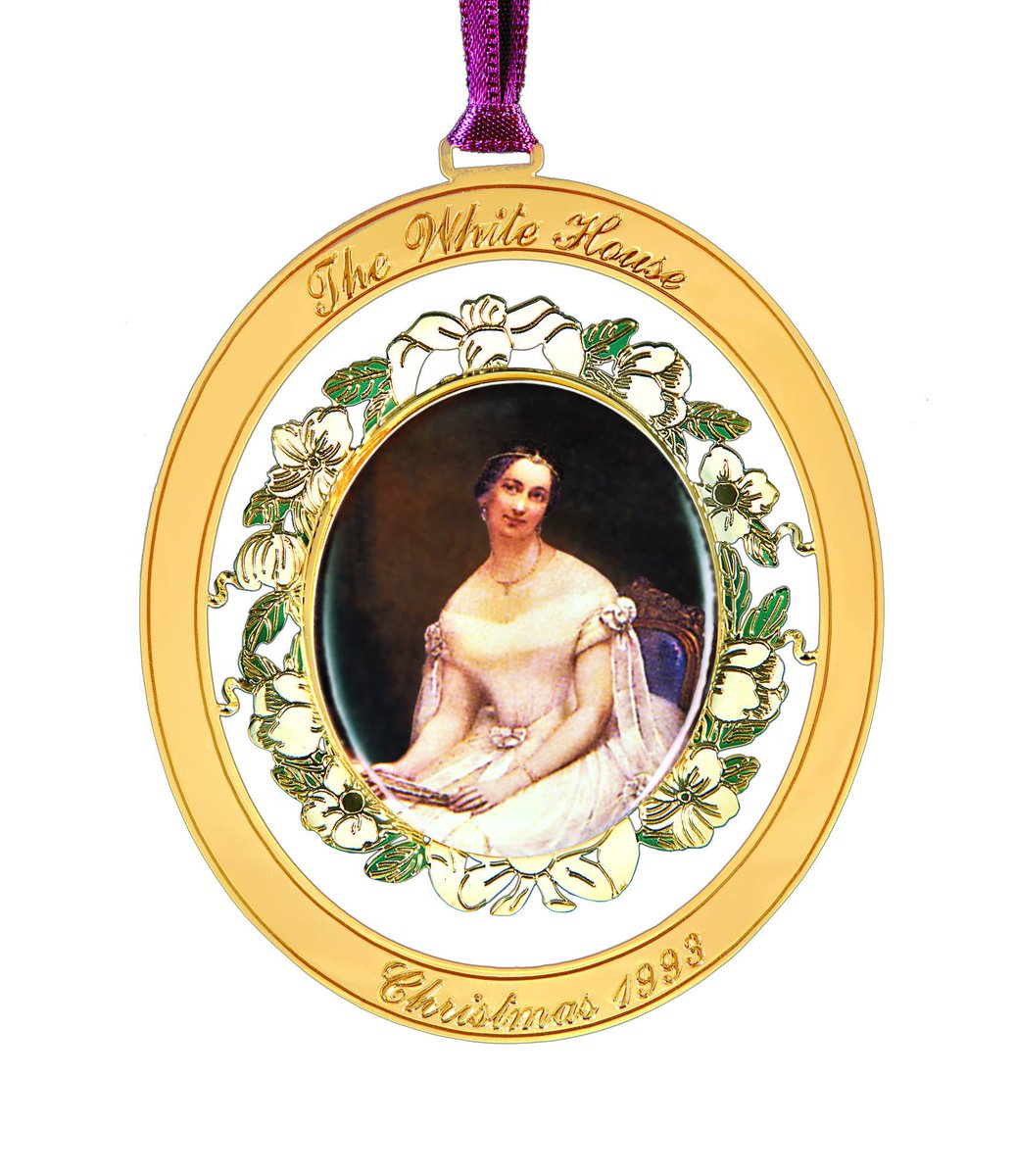 The 1993 ornament features a portrait of First Lady Julia Tyler. President John Tyler was the first to marry while in office. Her portrait was the first of a comprehensive White House collection of portraits of the first ladies. https://shop.whitehousehistory.org/holidays/ornaments/1990-1993-four-white-hour-ornaments-sold-as-a-set