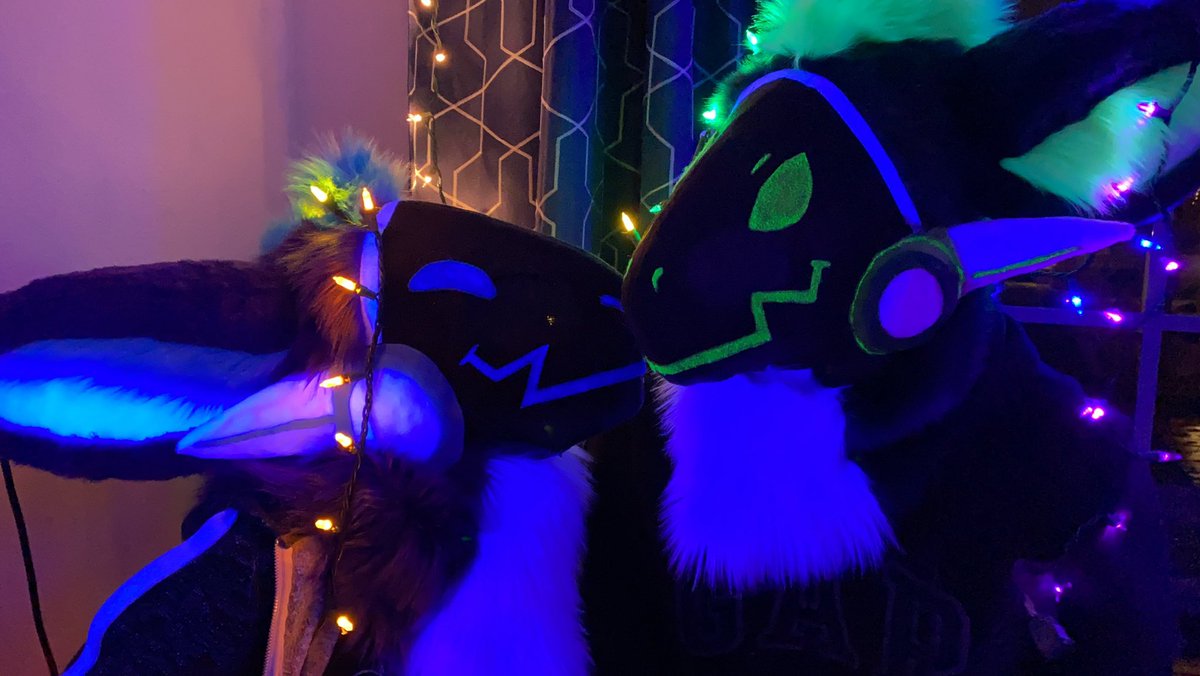 https://www.thedealersden.com/listing/uv-reactive-protogen-fursuit-head/156...