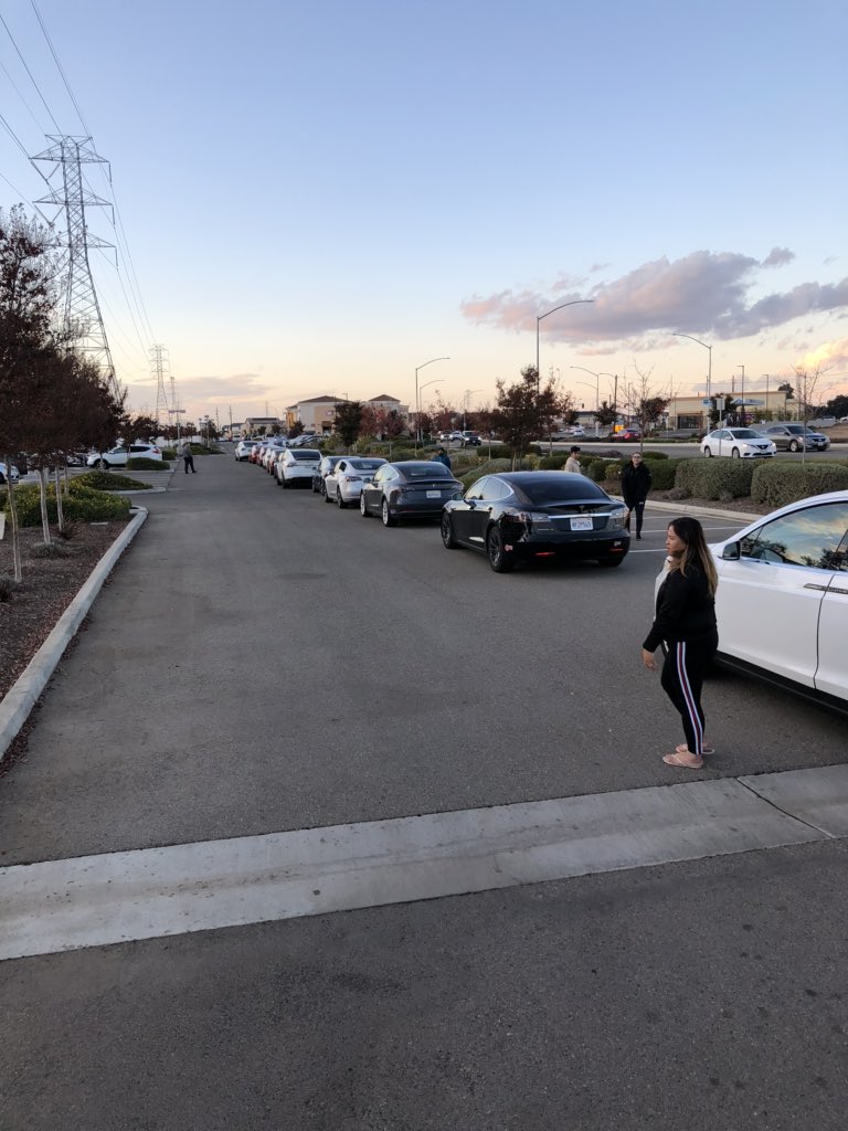 spaldrich's tweet photo. I’m grateful for the charging network and my first time with an issue. Stalls full (2 are not usable) and 12+ cars in line. Big bummer as we need to charge after the three hour drive before we can go on. @elonmusk please keep investing in the infrastructure as the company scales https://t.co/UkweSa6QCC