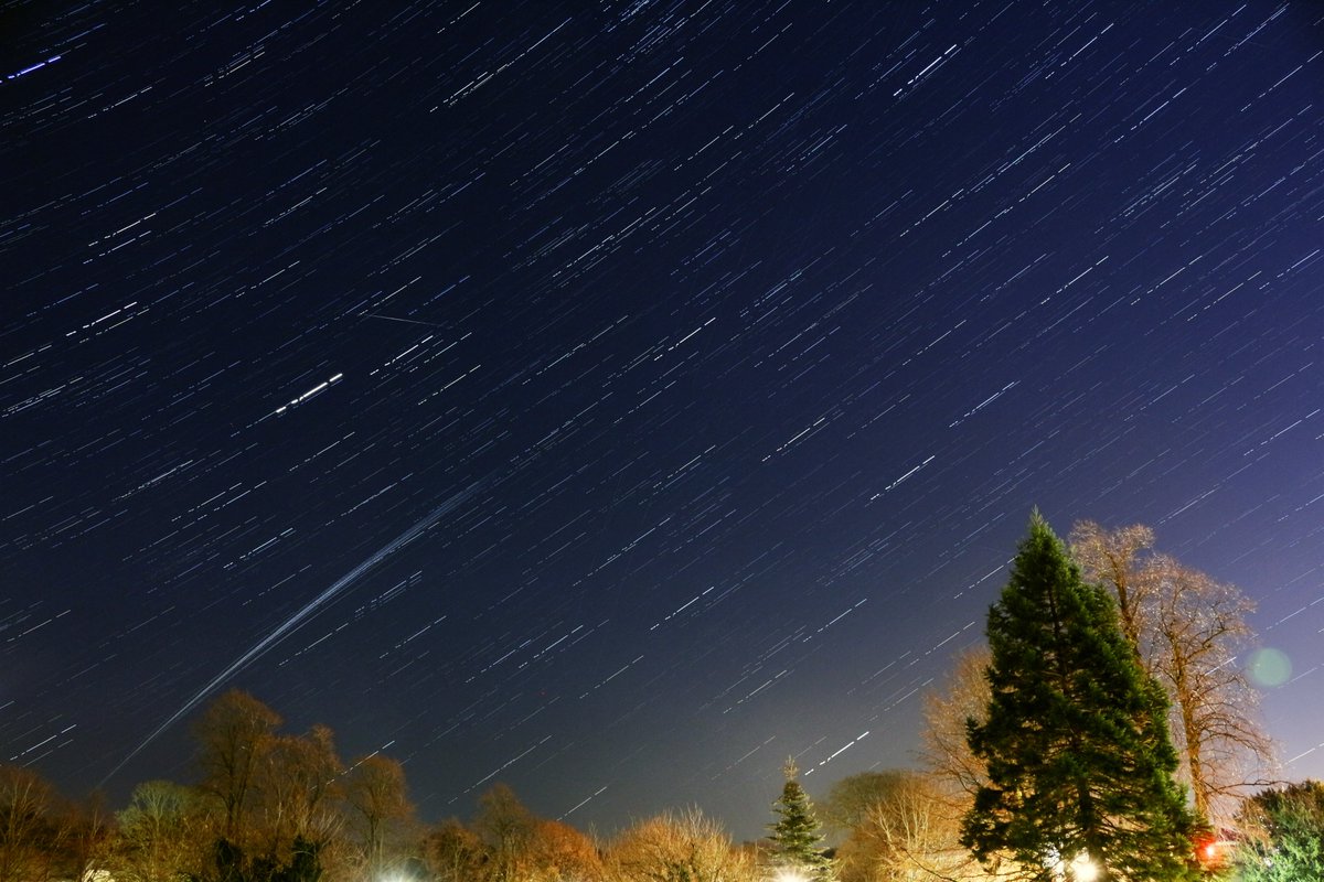 This one is a composite of several different photos (hence the star trailing), each of 30s exposure, showing multiple Starlink trails ...