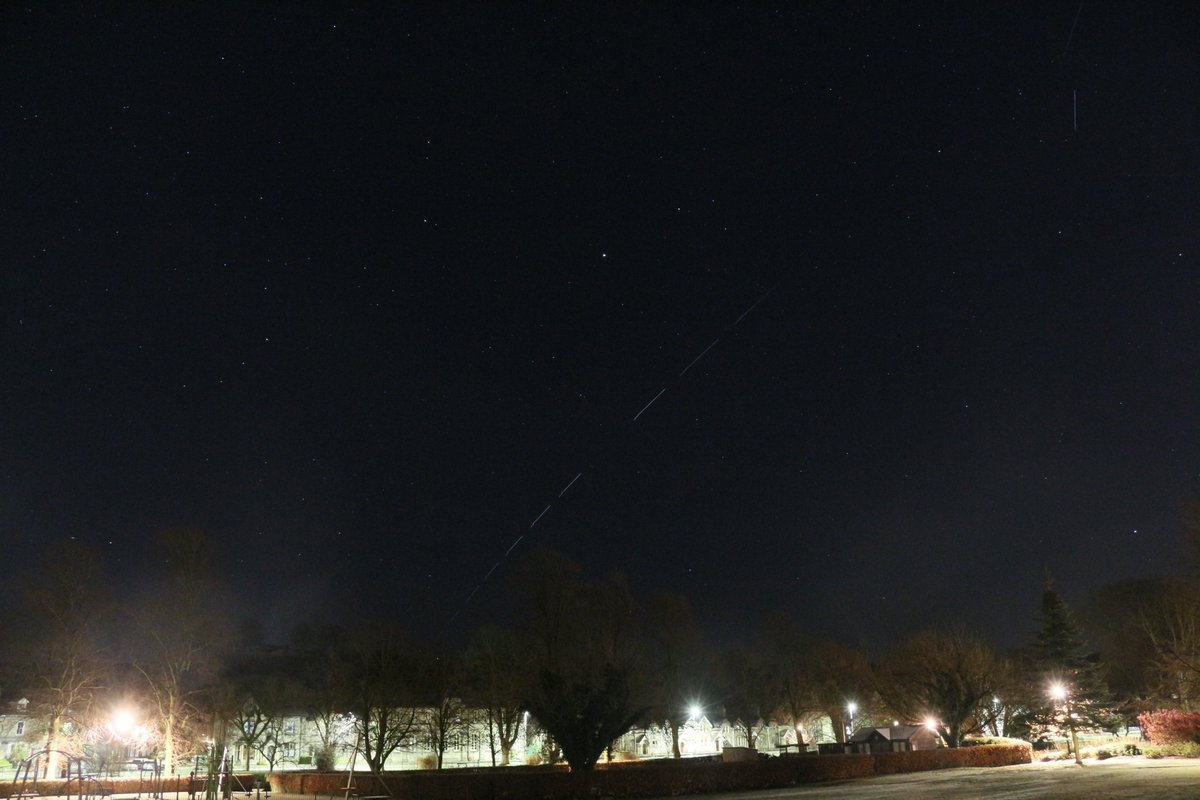 Another image, this time a shorter exposure of just a few seconds, showing eight individual Starlink trails...