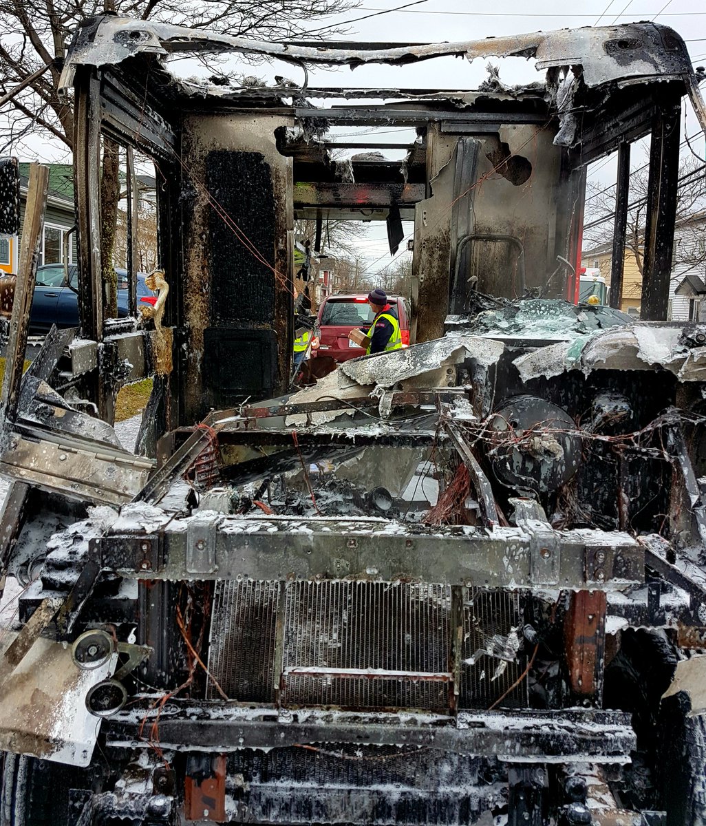 JonnyHodds's tweet image. Front and back view of the Canada Post van. If you look closely, the driver is still holding the package he had in his hands when the fire started -- literally the only package that wasn't damaged or destroyed in the incident. @cbcnl #cbcnl #nltraffic #sjrfd