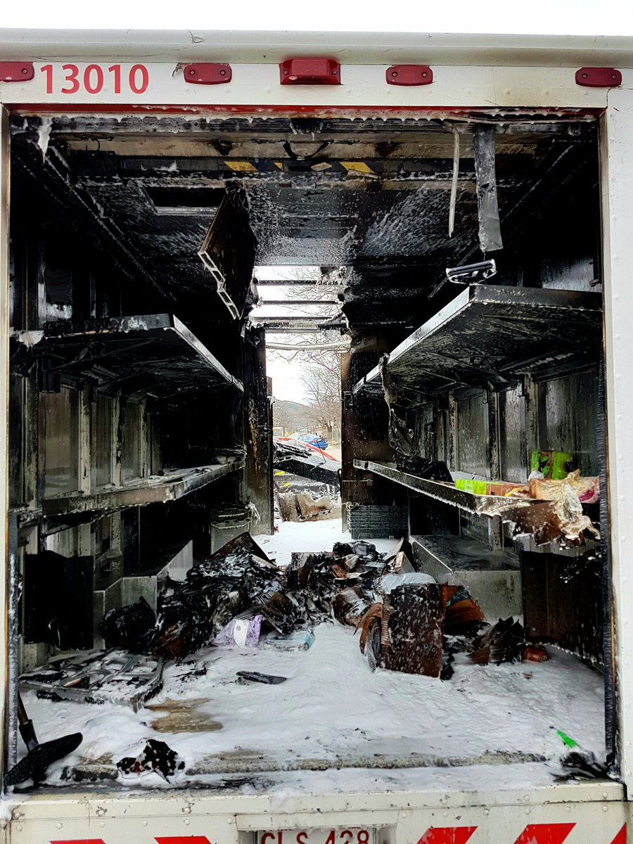 JonnyHodds's tweet image. Front and back view of the Canada Post van. If you look closely, the driver is still holding the package he had in his hands when the fire started -- literally the only package that wasn't damaged or destroyed in the incident. @cbcnl #cbcnl #nltraffic #sjrfd