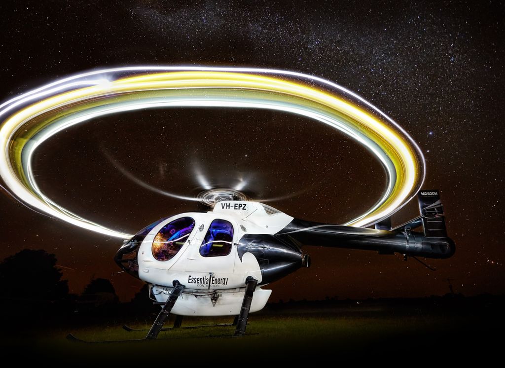 MDHelicopters's tweet photo. Saved one of the best for last! This stunning photo of Essential Energy’s #MD520N, operated out of Australia, completes a year of great #MDhelo photos from our #MDcalendar! 
#notar #nightsky
PC: Stewart Gould https://t.co/UnTzjozdHj