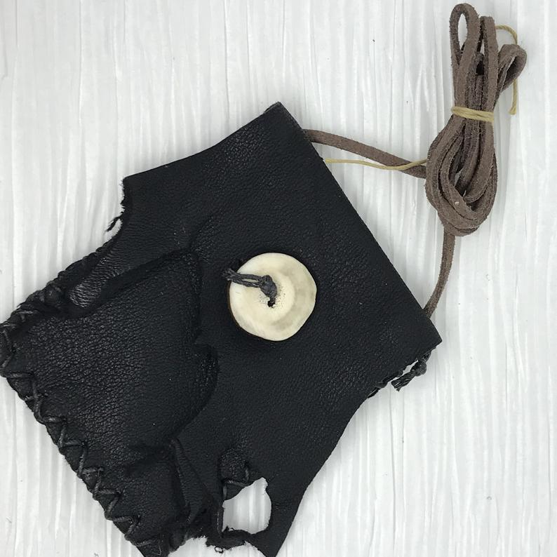 WyomingWild1's tweet image. Black deer hide. Lightweight deer hide neck pouch. deer antler/horn button closure. #wyomingwild #bonebutton #handmade #uniquegifts
