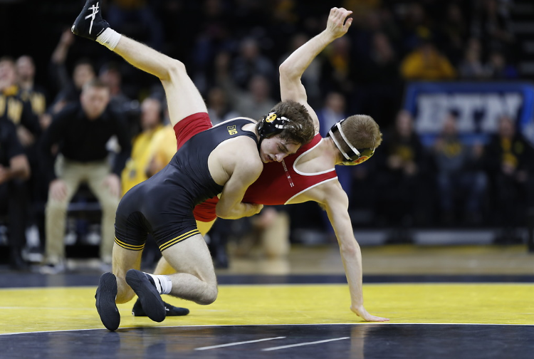 NCAAWrestling's tweet photo. 🚨 DOWN GOES NO. 1 🚨 Wisconsin's top-ranked 133-pounder Seth Gross drops to Austin DeSanto 6-2 as Iowa takes an 8-0 lead in the dual. The Hawkeyes 1-2 punch at the lightweights is as dangerous as ever #FightForIowa
📸: @Hawks_Wrestling https://t.co/fyE13RSmRt
