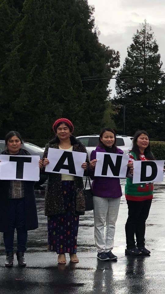 OoKoLinn3's tweet photo. We stand with Daw Aung San Suu Kyi, that's what #Myanmar diaspora in California , San Francisco Bay area say. The rain and the weather cannot hinder the strong support. https://t.co/0ghmjJOK4Y
