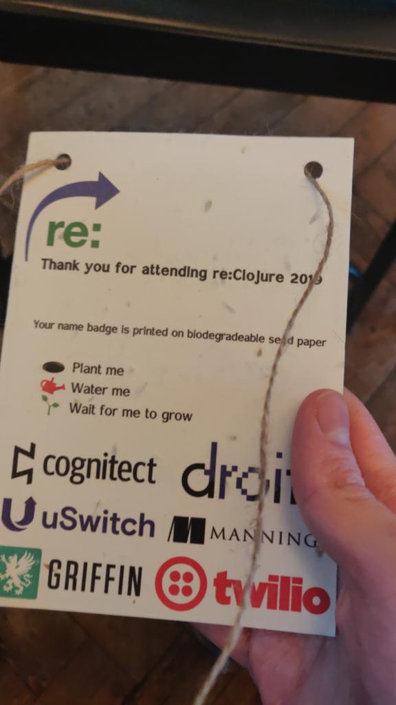 OliverCaldwell's tweet image. I love the name badges! #reclojure
