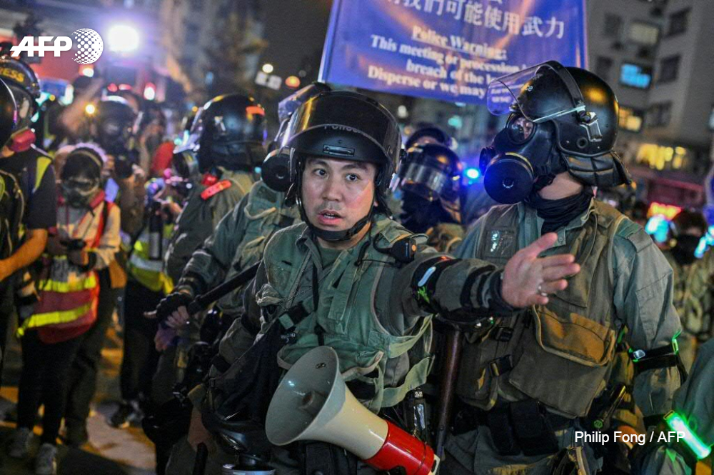 AFP's tweet photo. #UPDATE China suspended US warship visits and sanctioned American NGOs on Monday in retaliation for the passage of a bill backing pro-democracy protesters in Hong Kong https://t.co/x4lGLKsTVD https://t.co/TogGxsNNkc