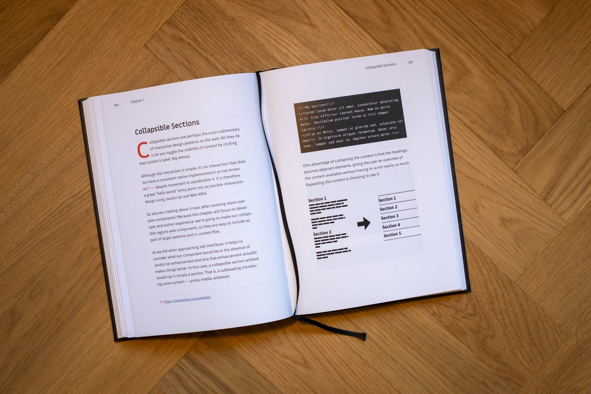 An inner view, Collapsible Sections, with a black ribbon bookmark.