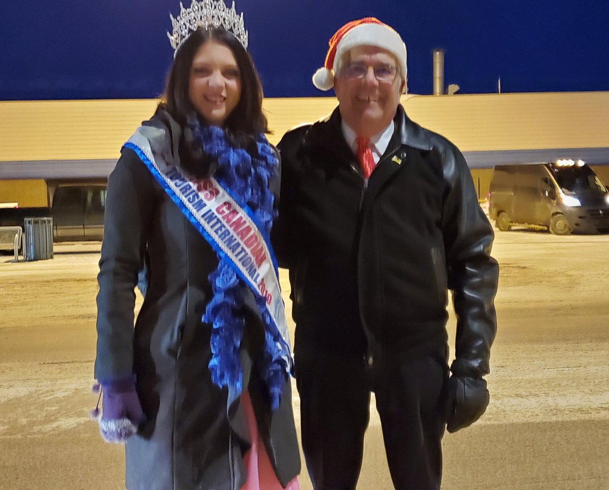 Walking the Santa Claus Parade with Tristan Johnson England, Miss Canadian Tourism International.