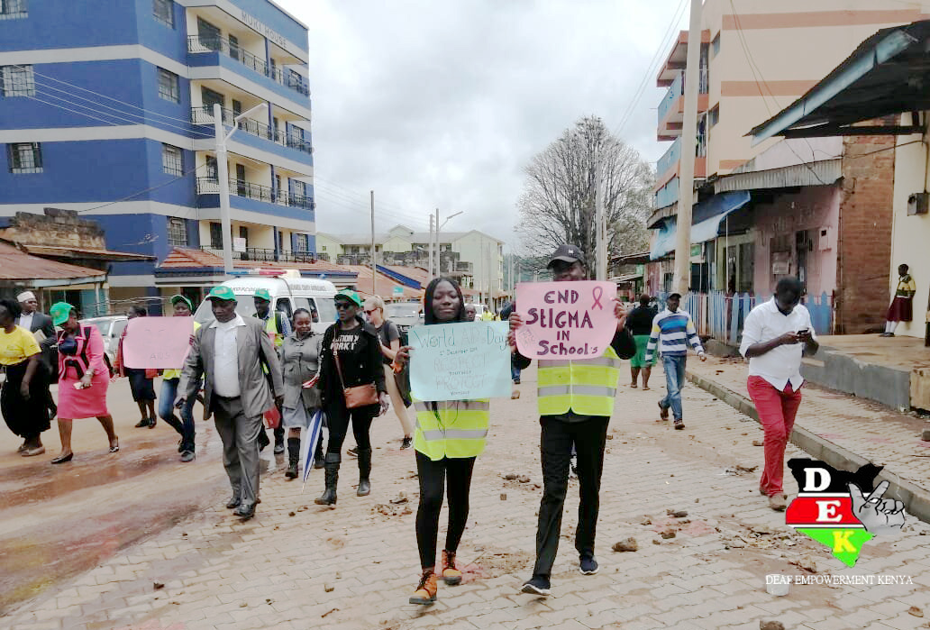 dek_kenya's tweet photo. DEK members during the 2019 World AIDS Day function. The team participated in the mass awareness campaign which emphasized 5 key-points to end the HIV pandemic:
1.KNOW
https://t.co/vzfkJZCDUN
3.PROTECT
4.TEST
5.TREAT https://t.co/DOMUzU6iGn