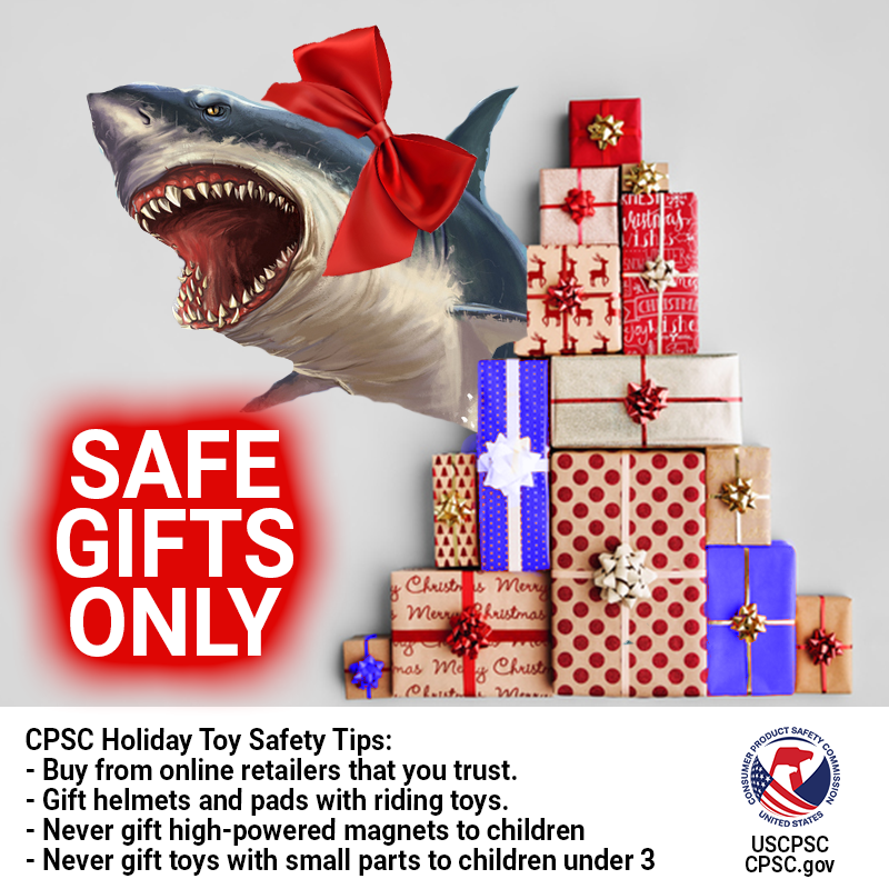 A shark with a bow on its head jumping out from behind a giant pile of presents. The text reads: safe gifts only. Buy from online retailers that you trust. Gift helmets and pads with riding toys. Never gift high-powered magnets to children. Never gift toys with small parts to children under 3.