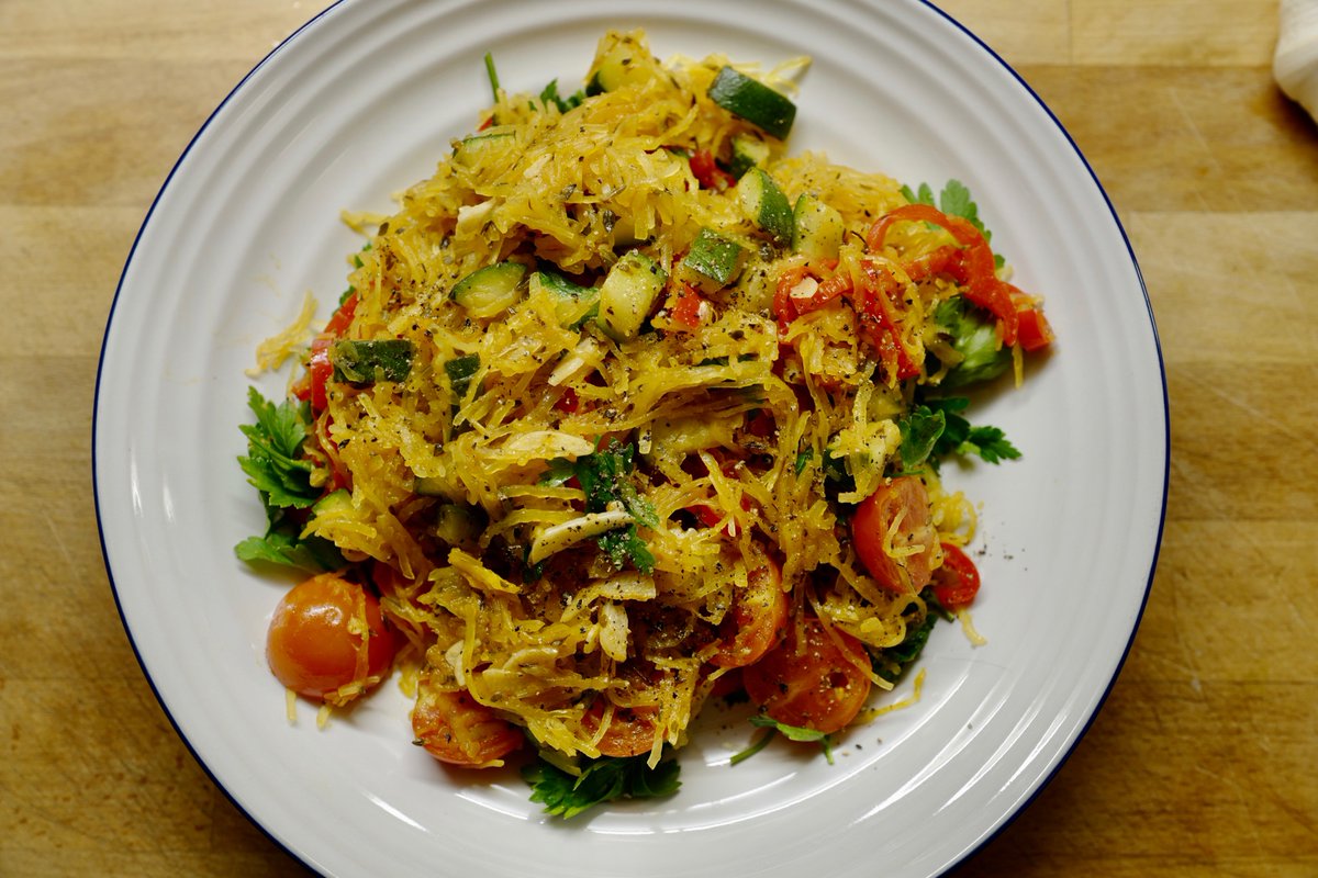 Dinner: finally got a spaghetti squash! It does not taste like spaghetti but it’s fab! Baked squash—forked out strands then mixed with sautéed garlic, courgettes, red peppers, cherry toms, oregano, cayenne, sea salt, olive oil, flat leaf parsley, black pepper, lemon juice