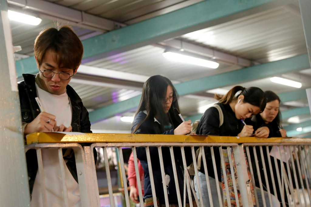 Reuters's tweet photo. 'We can celebrate later': Hong Kongers pen Christmas cards to protesters https://t.co/j49ed6tAOD https://t.co/CTnmyt5RuW