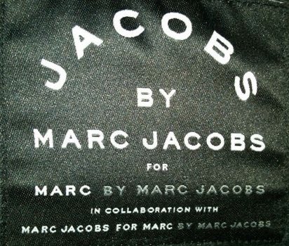Just in case you didn’t know who was behind this piece of clothing...It’s Marc Jacobs. For, by, with, next to, opposite, parallel parked by, cooked by, taught the Tango by, had a facial by...Marc Jacobs. By Marc Jacobs.