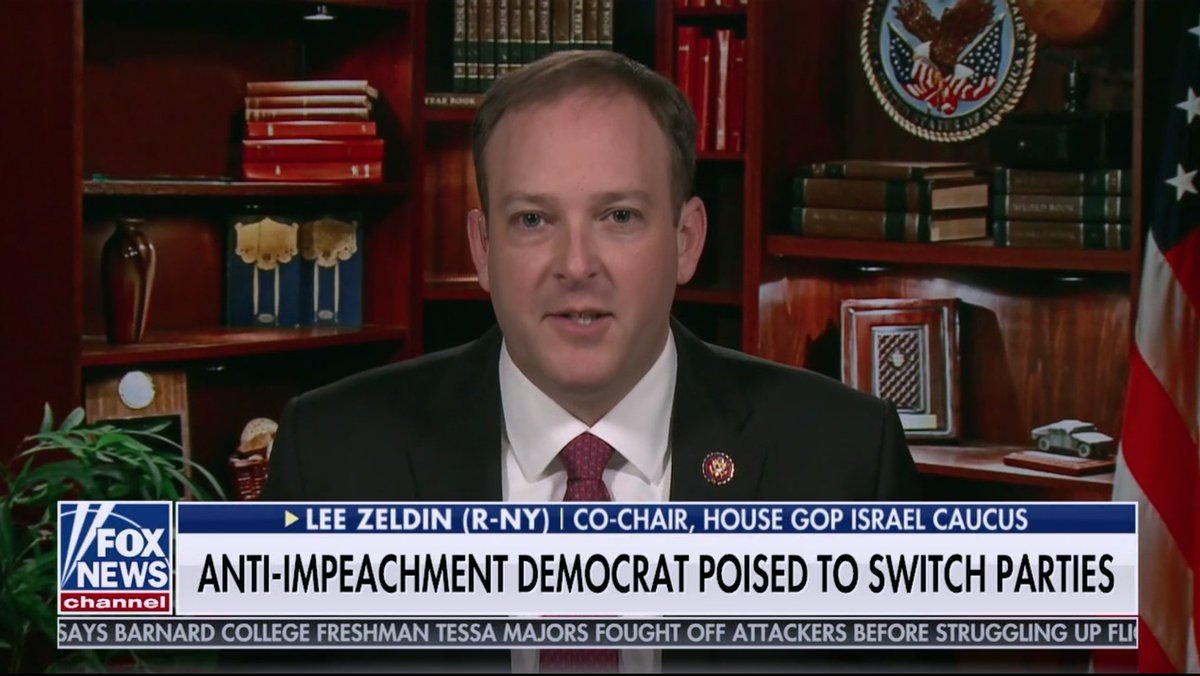 26/ Sunday 7:26 AM  @foxandfriends Has  @RepLeeZeldin (R-NY) been living in his TV Library Nook since Friday? He looks fresh!We're still wondering, though, where those pictures of his children went, and that tiny little menorah representing the House  @GOP Israel Caucus.