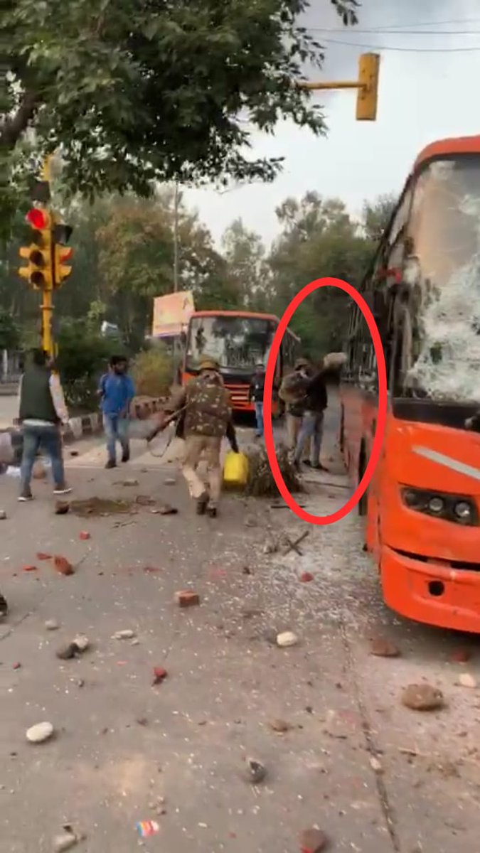 writesalman's tweet photo. Delhi Police is instigating violence and burning buses to derail and divert people's movement for Justice against CAB. 

Everyone please #Tweet with 
#PoliceStopViolence
#CABPolitics https://t.co/9eaauQ0qbE