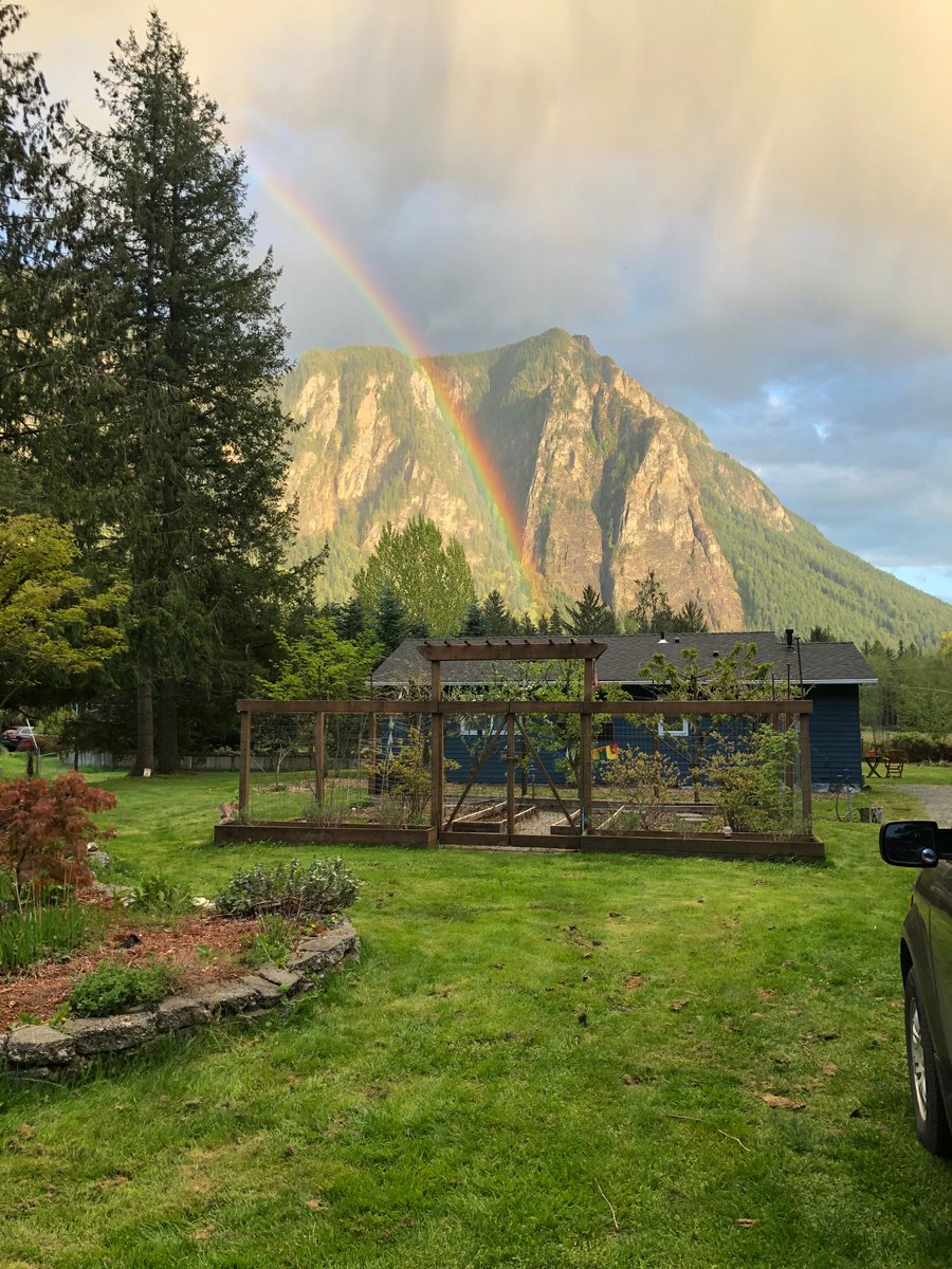 A serene rainbow looks as if it could be touching Mount Si.
wildemoonretreat.com  
#wildemoonretreat