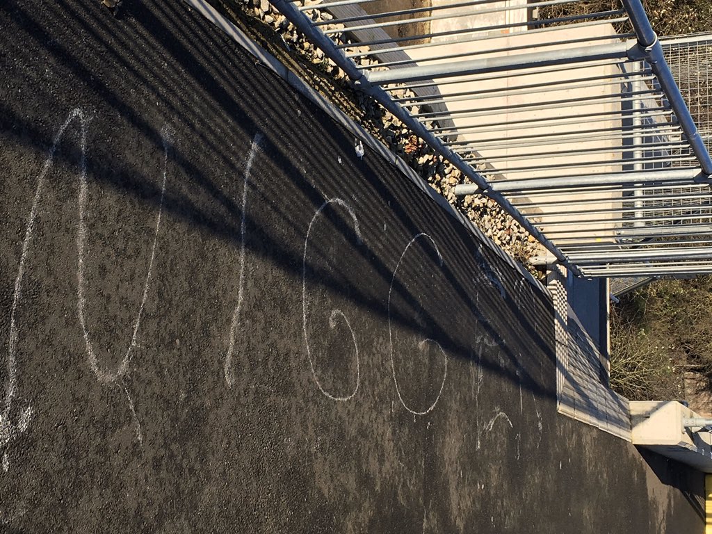 WhitstableNaomi's tweet photo. Shocked to see this racist graffiti at a retail park in Whitstable today. I’m hoping that there is CCTV coverage for the area and that the owners have reported to the police. #NotMyTown. https://t.co/eSVNW3Mj58