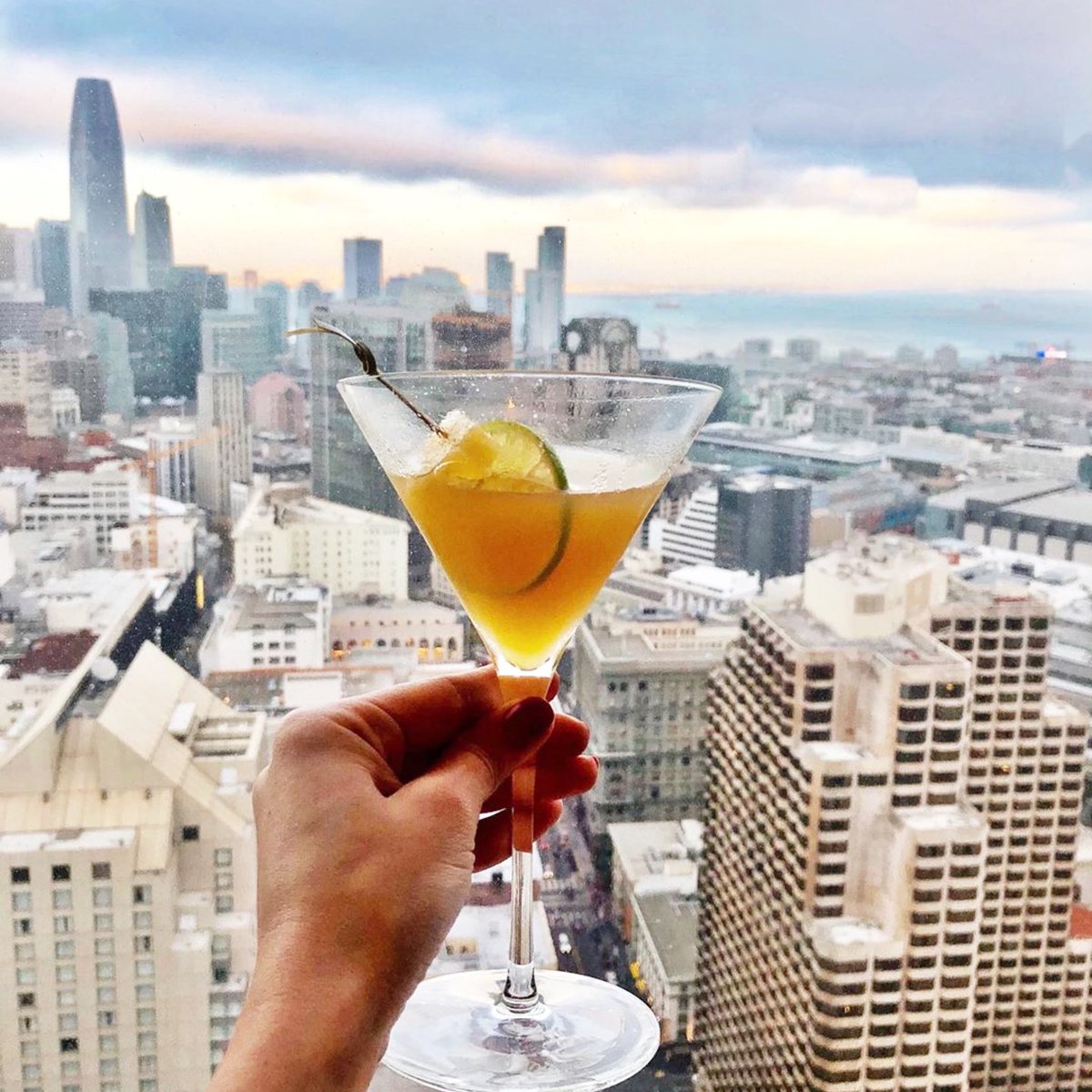 Guest <a href="/micamilanesi/">Micaela Milanesi</a> tops off her Cityscape view with a toast to the San Francisco skyline. Cheers! #CityscapeSF