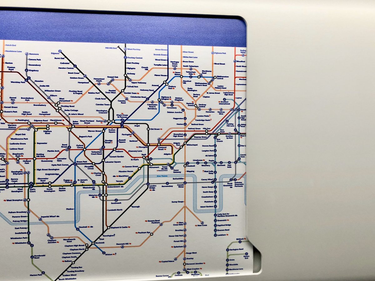 Burdett's tweet photo. Hey @TfLRail. Why don’t the maps fit in their allotted frames on your trains?
You ought to allow more space for the margin. #ading #purpletrain https://t.co/pZ2leXqjFF
