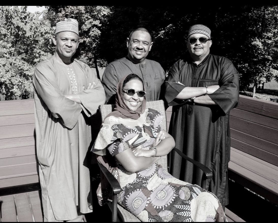 My younger brothers, sister and me last month at a family gathering.