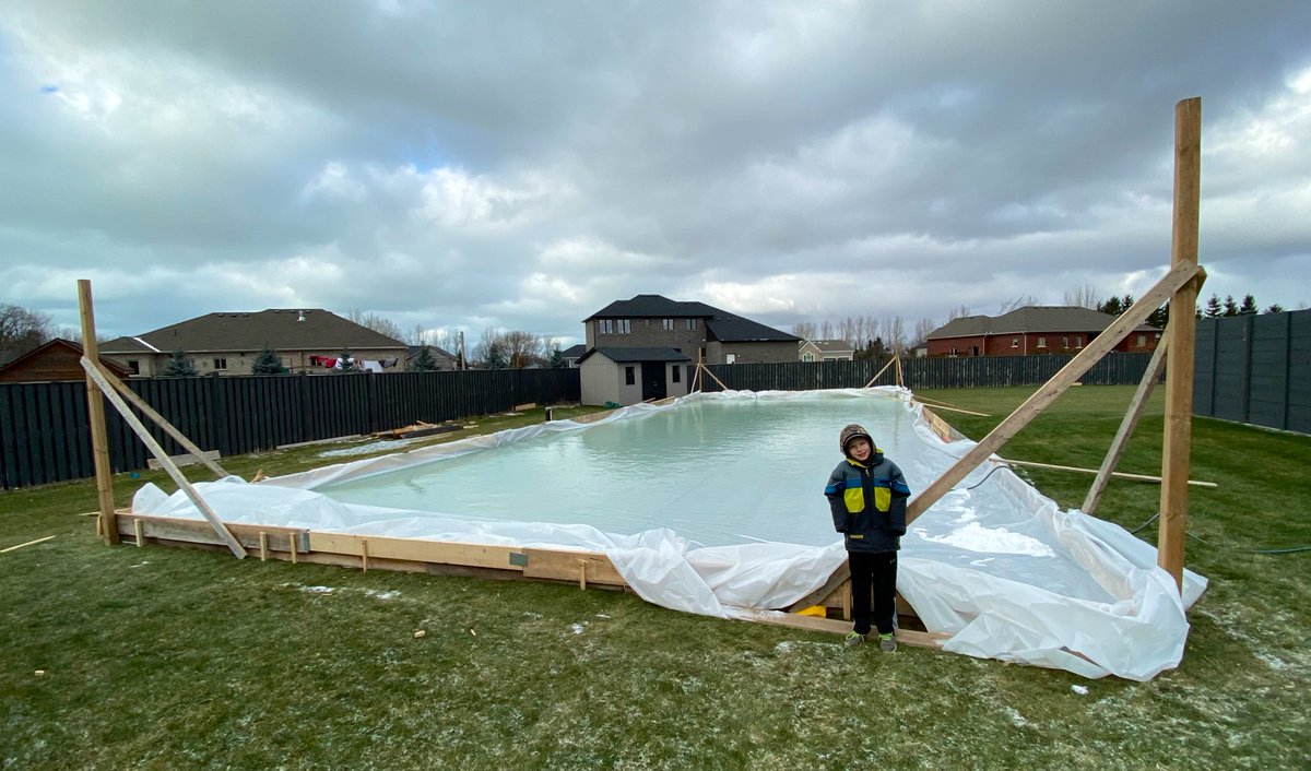 Have some pretty cool neighbors! Through the hose over the fence to help fill this bad boy! Bigger and better then last year so let’s hope for some decent weather to freeze it yet still wanna be outside on it! #BackYardRink
