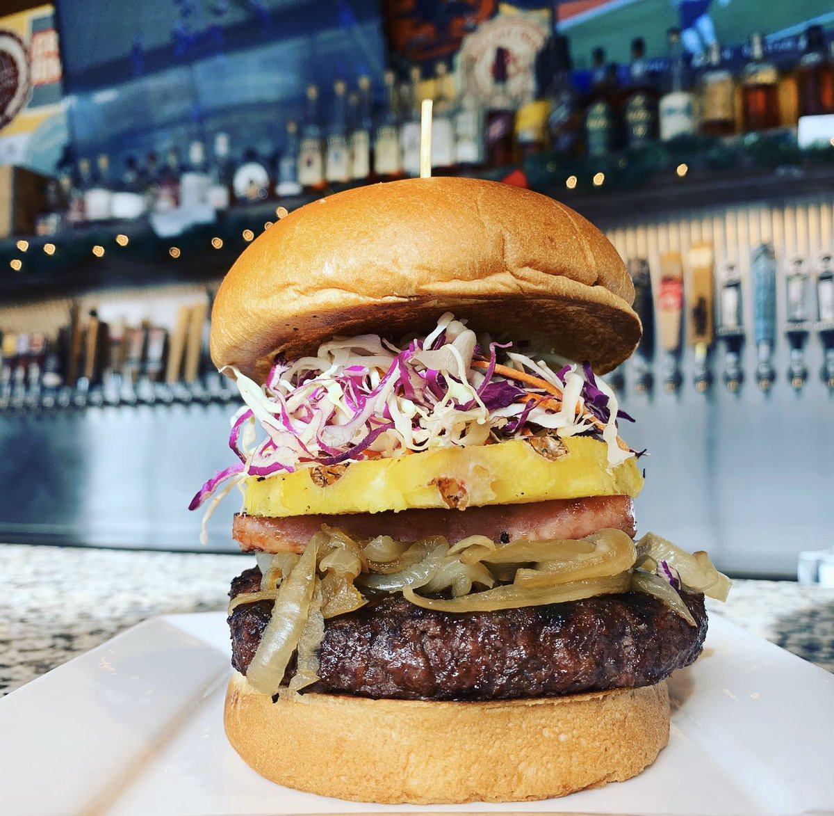 BOW: Mele Kalikimaka

Signature Patty
Seared Spam
Grilled Pineapple
Cabbage
Spicy Teriyaki
Mayo
Sautéed Onion
Brioche

#burgeroftheweek #hawaiianchristmas #burgerbar