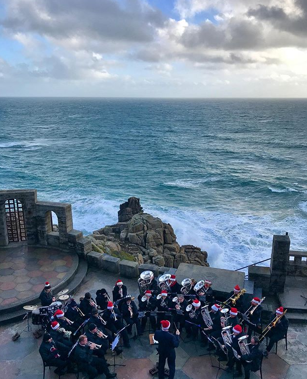 Wow to this wintry picture of <a href="/pendeenband/">Pendeen Silver Band</a> braving the blustery weather to play the <a href="/minacktheatre/">Minack</a> this weekend cc @ambermb
