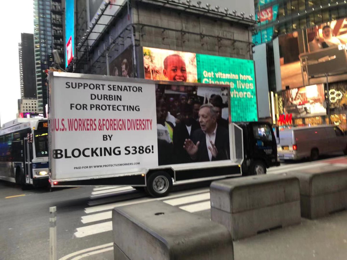 ChineseAZ's tweet photo. #Breaking Today in the #NYC #TIMESSQUARE, #AmericanWorkers take action with movable Truck Advertisement In support of our hero, @SenatorDurbin, for blocking Senate controversial GreenCard Giveaway Bill #S386, because this Unfair Bill favors immigrants from 1 nation ONLY. #NoS386 https://t.co/IKX3ePQ1Nh