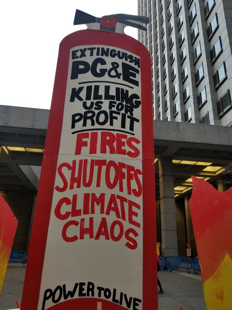 MaskOakland's tweet photo. BREAKING: Activists have LOCKED DOWN all entrances to PG&amp;E headquarters in San Francisco to demand they give back their profits until safe, that @GavinNewsom must hold killers accountable and protect vulnerable communities. #PGEisKillingUS #PowerToLive https://t.co/7LOsldo5fS