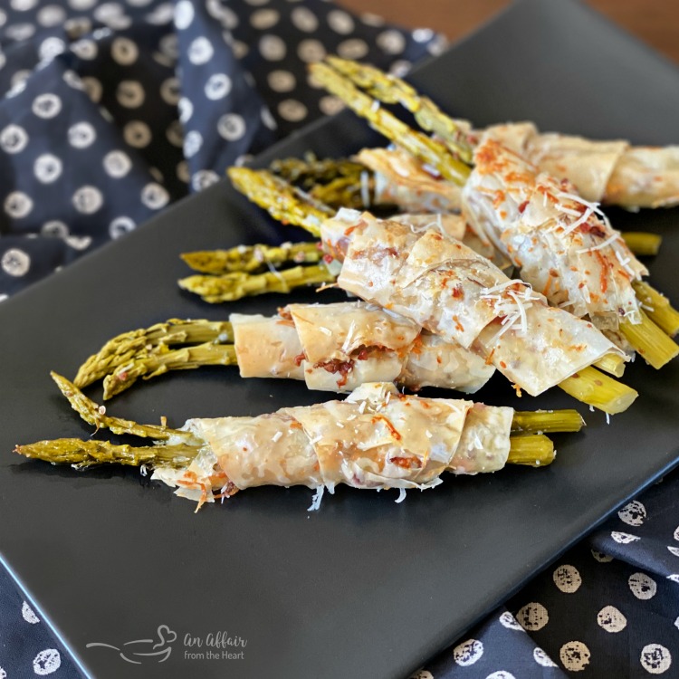 affair_heart's tweet photo. BACON &amp; CHEESE PHYLLO WRAPPED PICKLED ASPARAGUS is a hot appetizer with a beautiful presentation. Phyllo dough with bacon, parmesan, and romano cheese and wrapped around perfectly spiced, pickled asparagus. #ad @elyfarms1  https://t.co/yWHvPhvRz6 https://t.co/A7COsKRNEo
