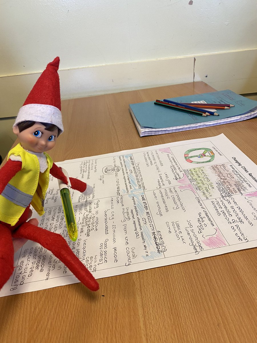 Geog_StMonicas's tweet photo. Elfie is helping Mrs Watson with her marking. ‘Enya Hartley’s work is Elfie’s favourite so far’. #helpfulelf https://t.co/MfinzZVJeB