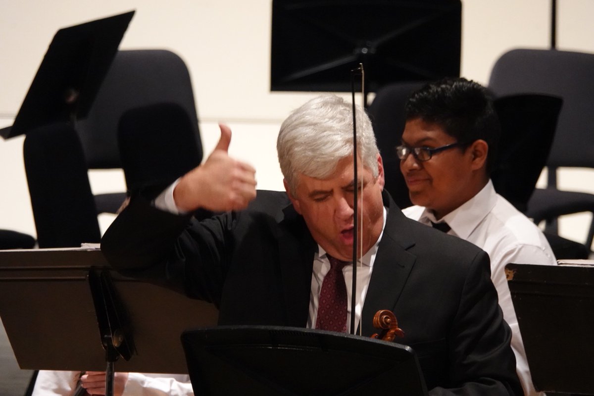 Mr. Farquhar gives the Rock 'N Roll thumbs up at the recent Winter Concert after Wired Up strings performed their selections. #orchestraisfun #d45learn4life #crazyorchestradirector