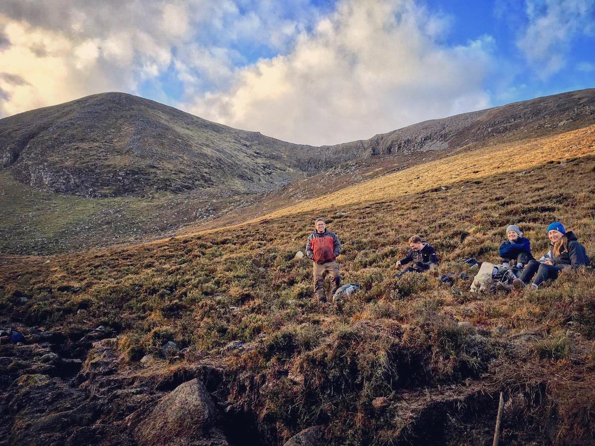 Frosty days on #SlieveDonard! As the weather turns cold, our team bask in moments of #Mournes sunshine for well deserved breaks! #WarmForWinter #WorkHardLunchHard #PlacesMatter