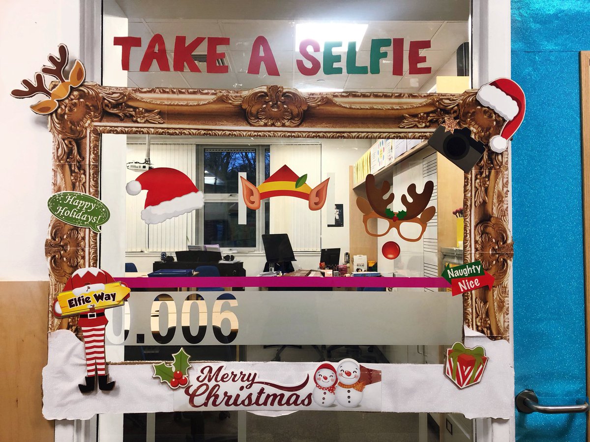The Christmas door is finally up!🎅🏻🎄❄️ big thanks to all my pupil helpers! #TakeasELFie #christmasQR #feelingfestive