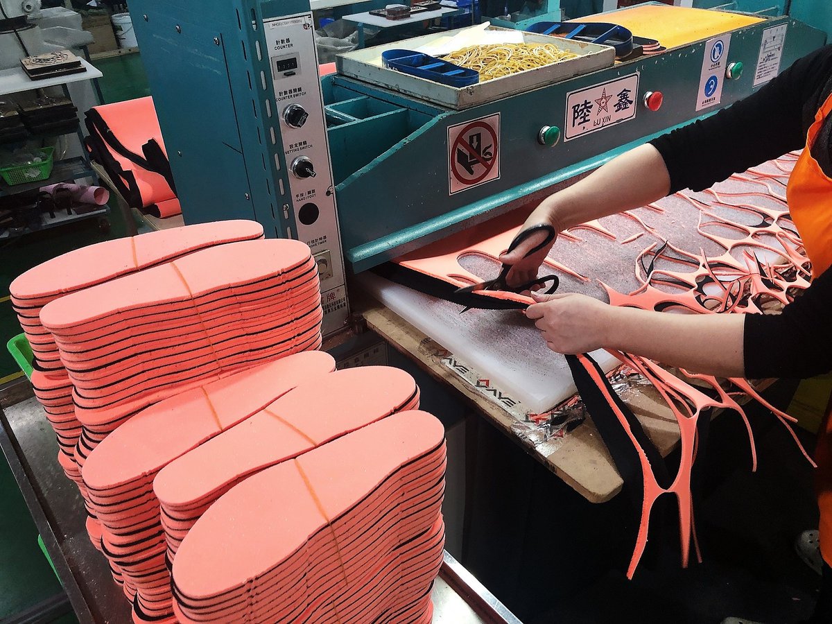 Die cutting for a multi-durometer, layered insole component. Sheet stock pattern pieces are cut as close together as possible to ensure minimal waste. ✂️