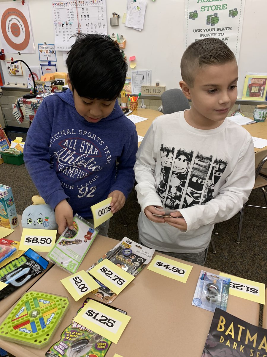 Decisions, decisions! Holiday shopping is upon us in our classroom store! Loved the variety of math strategies used on shopping receipts! #hustleandbustle #wrappingishardwork @mweschool #FTD4RKids