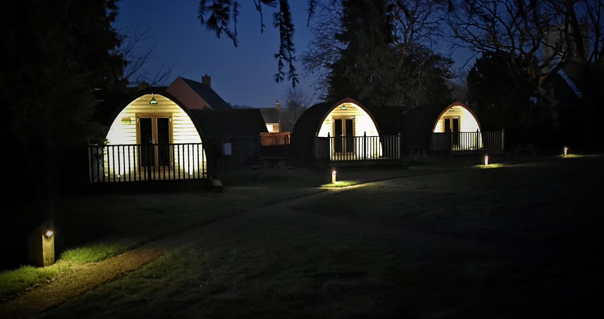 YHAStratford's tweet photo. Cosy times as night-time falls on our pod village 🌜✨🌌⛺🏕️ https://t.co/2pWlxJ2p4k