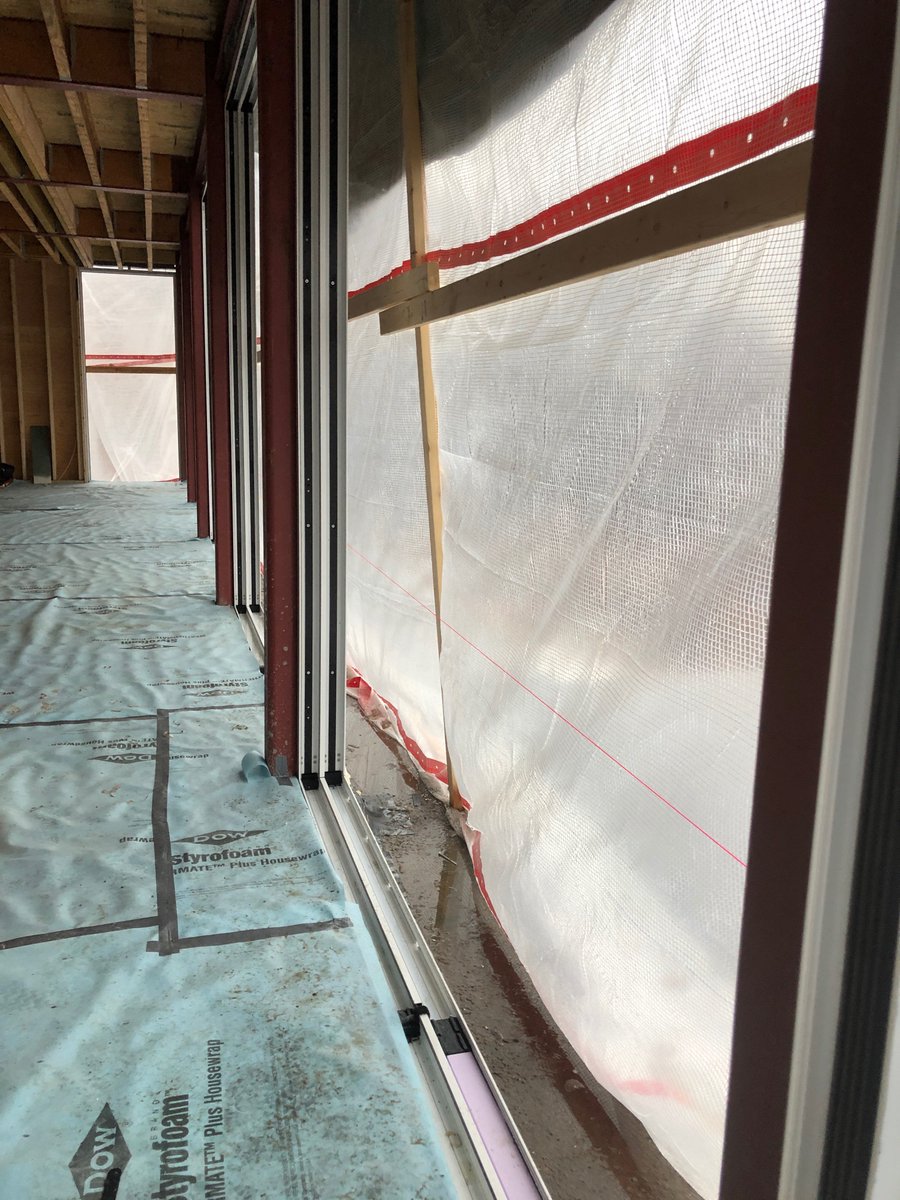 TannerWindows's tweet photo. swissFineLine install in New York State progressing... Today glass is on site and Tanner Construction begins glazing @TannerConstruct @swissfineline @PeakBP #framelessglazing #framelessslidingdoors #highperformancebuildings https://t.co/wvBDKVSC6N