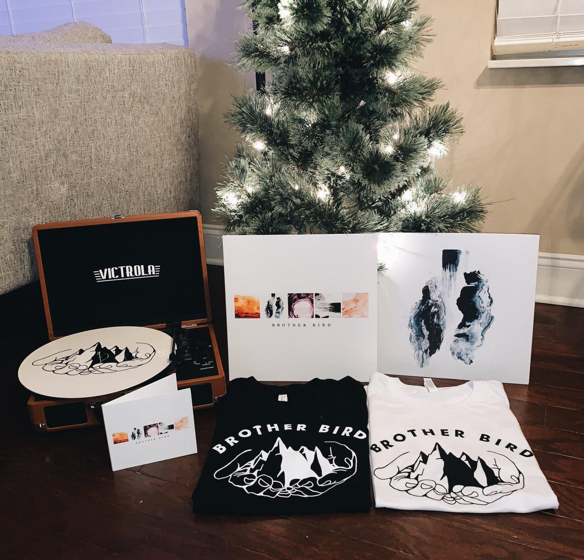 cute holiday merch bundle available on my site until January 1st. 

[vinyl, signed/personalized CD, &amp; tee] 🌲

brotherbirdmusic.com