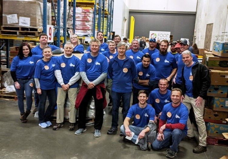 FTNAssociates's tweet photo. More than 20 volunteers from FTN’s Little Rock Headquarters recently labeled and packed cans for the Arkansas Food Bank. The organization serves 280,000 people in 33 counties, and they are always needing volunteers and donations. For information, https://t.co/Gjvf0AxRPB. https://t.co/oBFcTpMptq