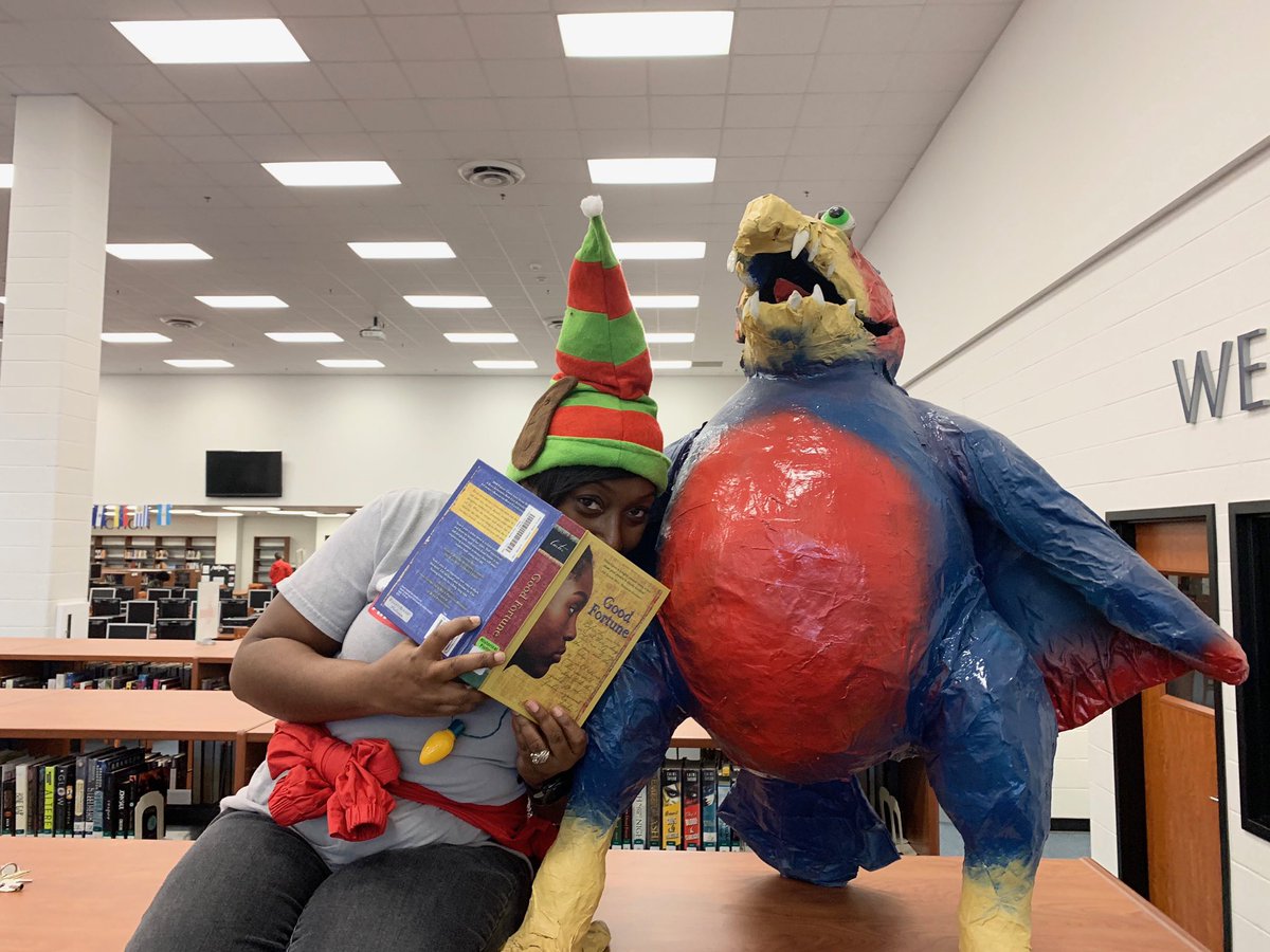 Our Elf on the Shelf reading in the library! <a href="/davishs_falcons/">Anthony Watkins</a>